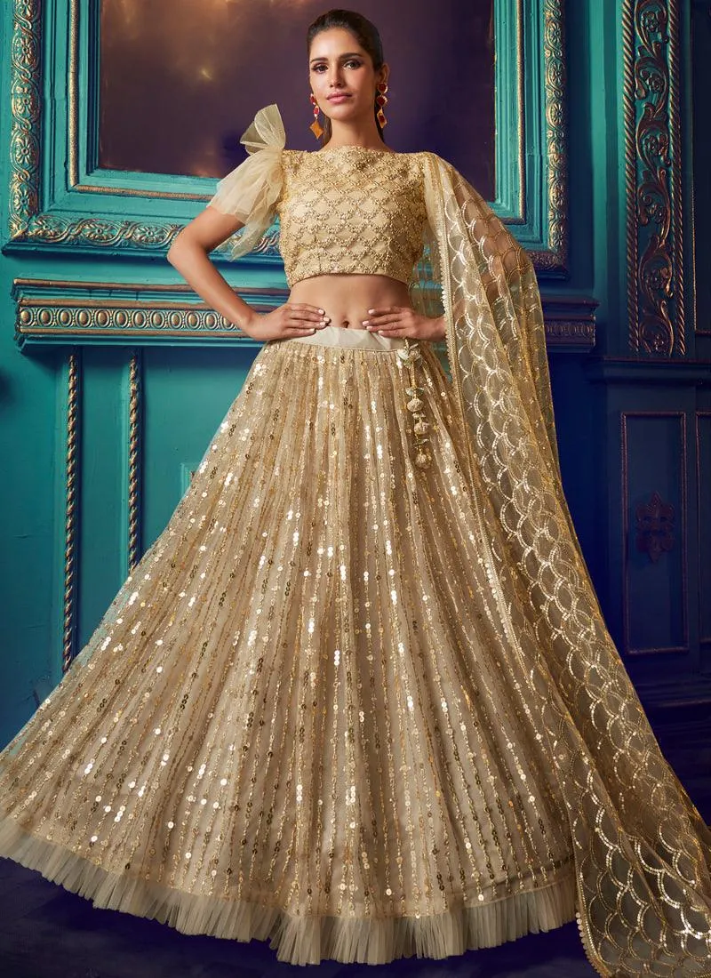 Admirable Beige Colored Soft Net Sequin And Zari Work Lehenga Choli